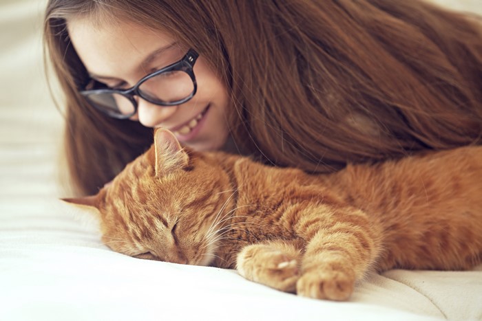 Girl with Ginger Cat Sleeping