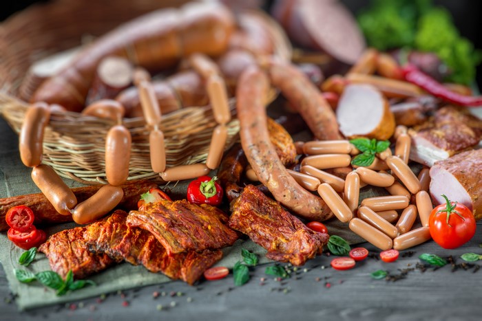 Assortment of Meat Products: Sausages, Ham, and Ribs