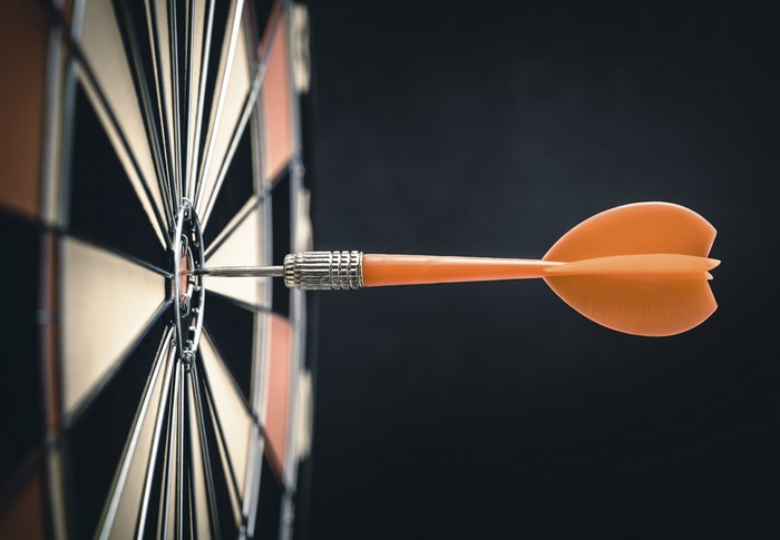 Dart hitting a dartboard