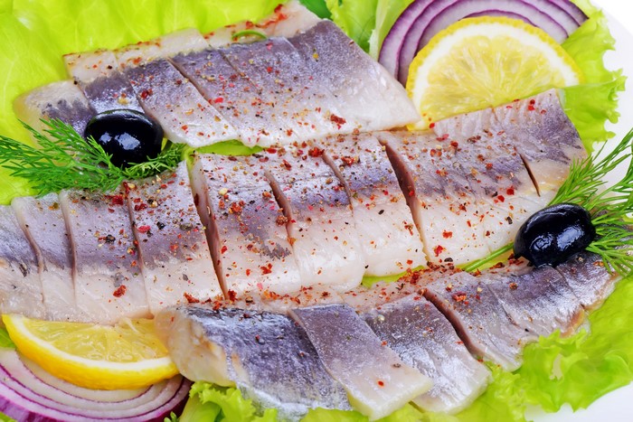 Sliced Herring with Olives, Lemon, Dill, and Red Onion