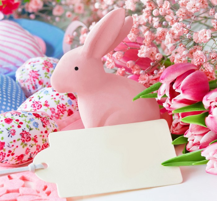 Easter bunny with tulips and eggs