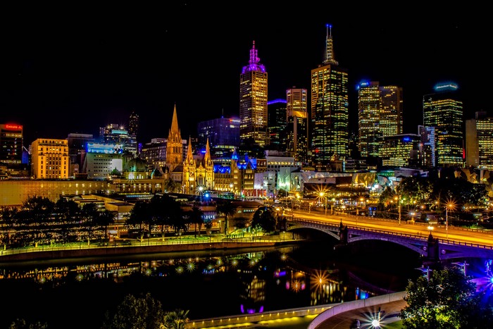 Melbourne skyline at night with Yarra River and bridges