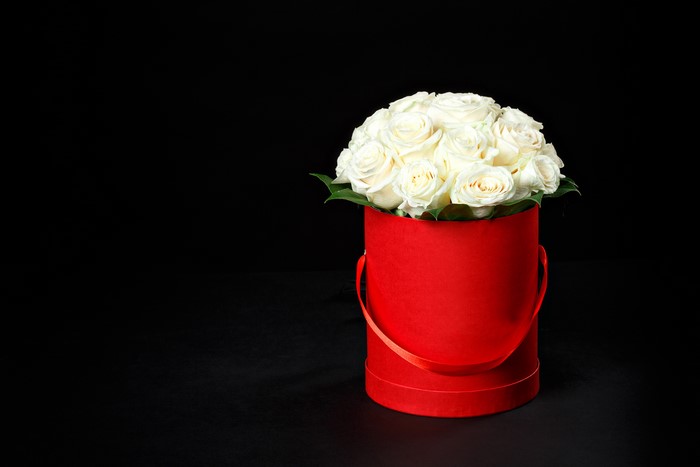 White Roses in a Red Box
