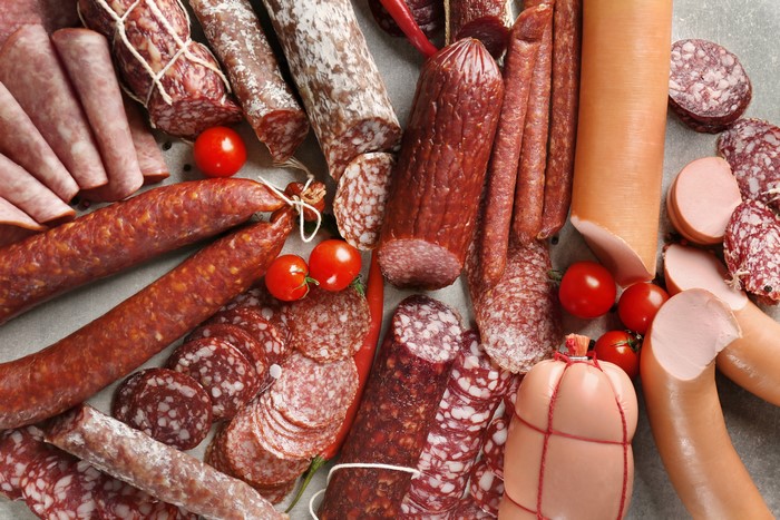 Assortment of sausages and cherry tomatoes