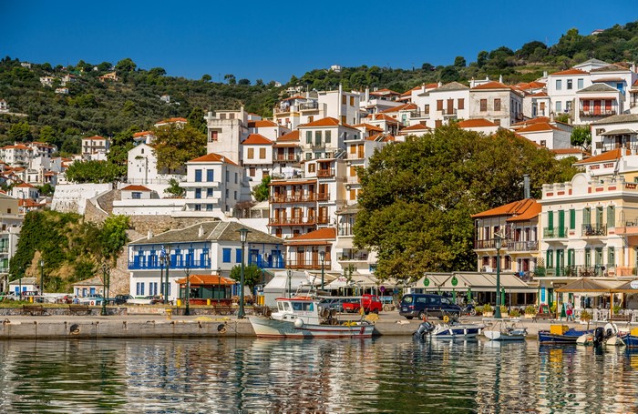 Coastal town with white houses and boats