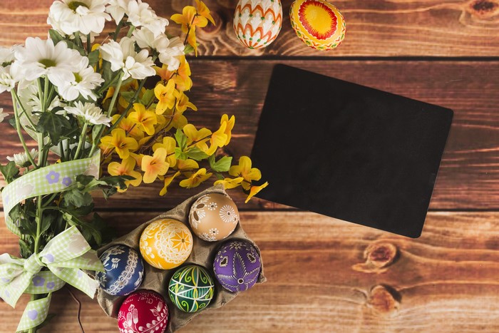 Easter Eggs and Chrysanthemums on Wood