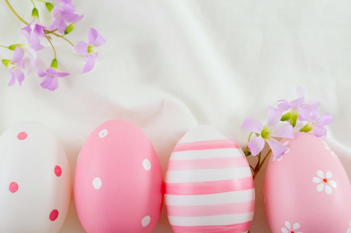 Easter Eggs with Flowers on White Fabric