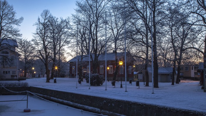 Winter evening in Naantali, Finland with snow and street lights