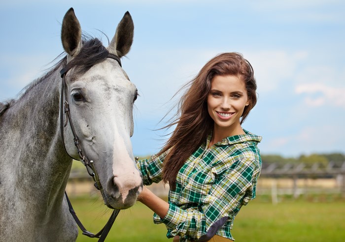 Woman in Plaid Shirt with Horse