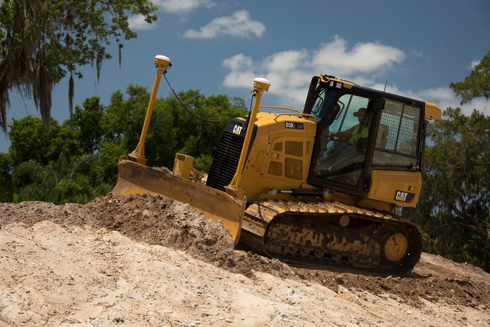 Caterpillar D3K2 LGP bulldozer grading sand
