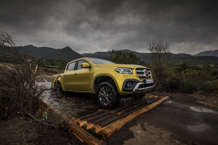Yellow Mercedes-Benz X-Class Pickup Truck Driving Through Water