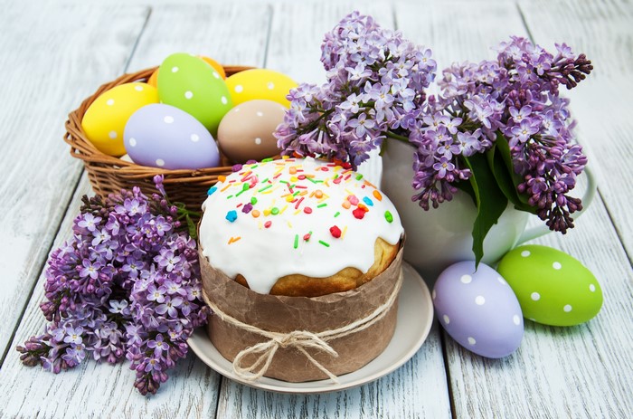 Easter cake and eggs with lilac flowers