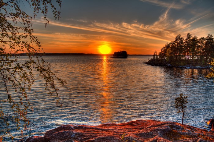 Sunset over a lake in Murikka, Finland