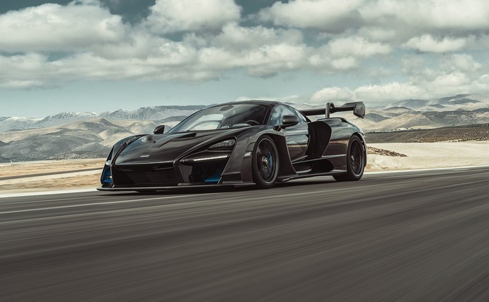 Black McLaren Senna driving on a road