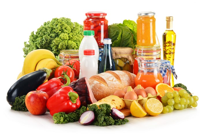 Assortment of fresh produce, bread, and groceries