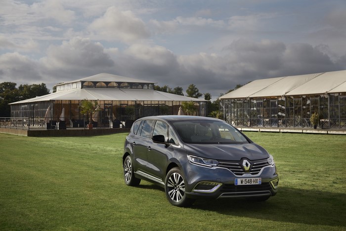 Renault Espace Initiale Paris parked on grass