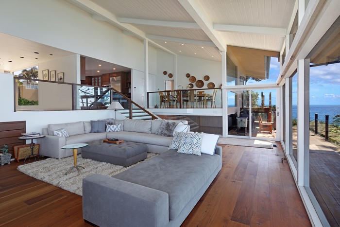 Living room with sectional sofa and ocean view