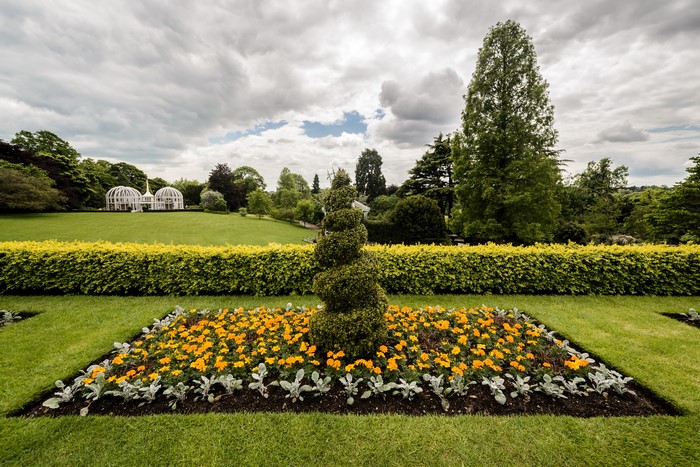 Botanical Gardens Birmingham England with flower beds and topiaries
