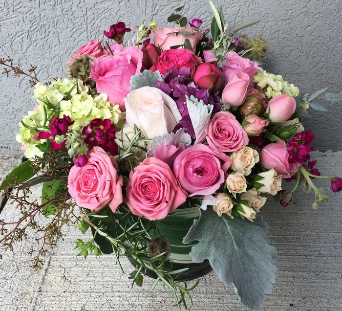 Pink and white roses and hydrangea bouquet