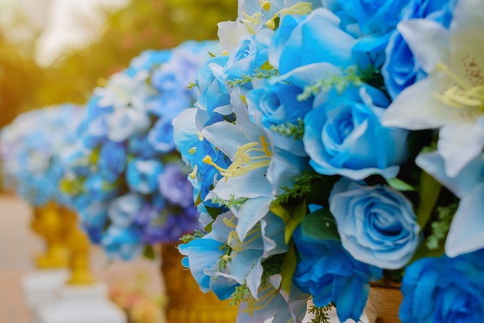 Blue Roses and Lilies in Vases