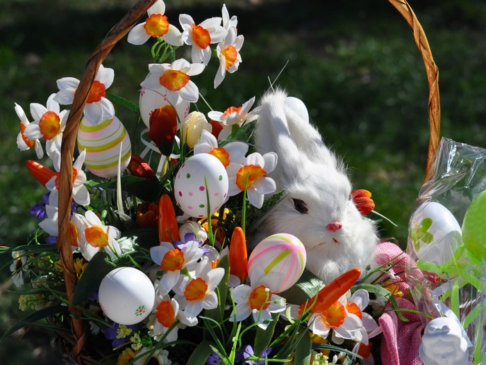 Easter basket with daffodils, eggs, and a bunny