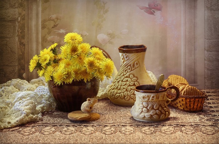 Still life with dandelions, cookies, and ceramic vessels