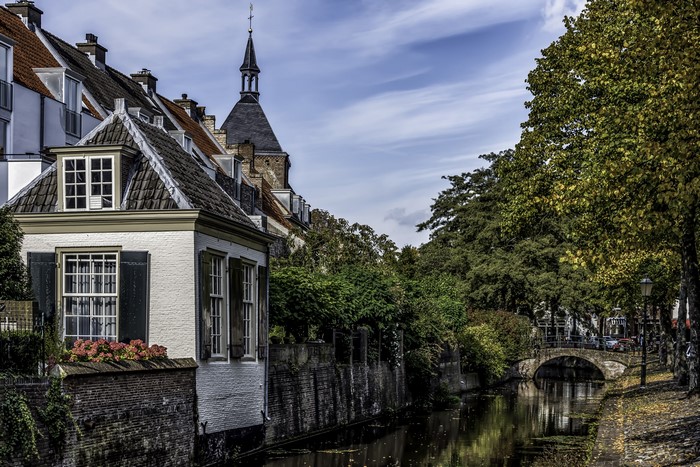 Canal in Amersfoort, Netherlands with Houses and Bridge