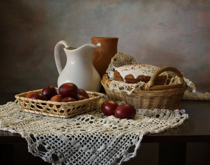 Still-life with Easter Kulich, eggs, and jug