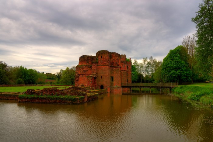 Kirby Castle ruins with a moat and bridge in England