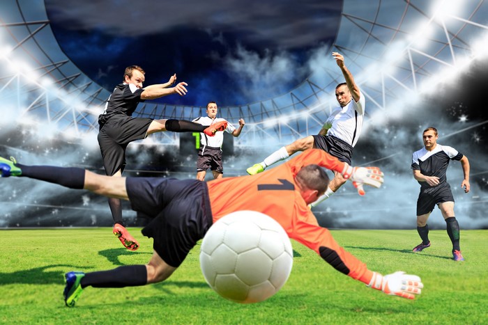 Soccer players in a stadium during a match