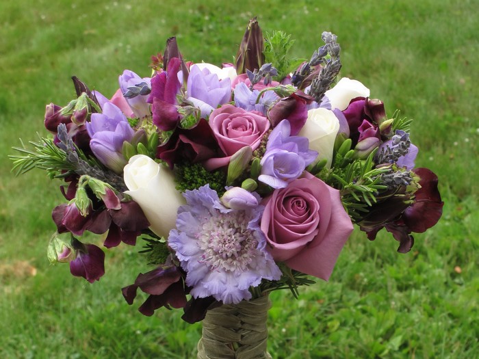 Purple and pink floral bouquet with roses and lavender