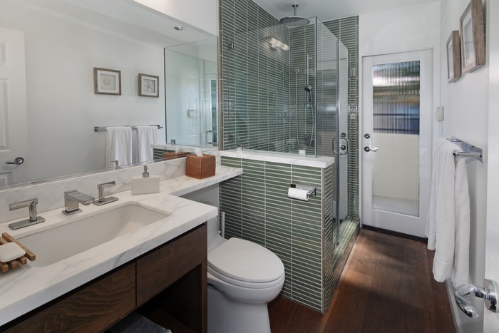 Modern Bathroom with Green Tile Shower and Vanity