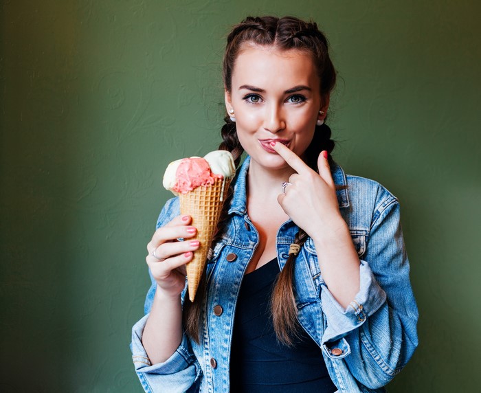 Woman with ice cream and braids