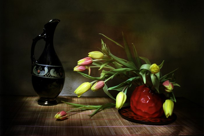 Still life with tulips and a black jug
