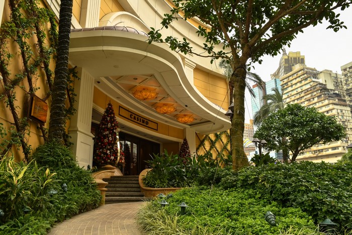 Casino entrance with Christmas trees and buildings