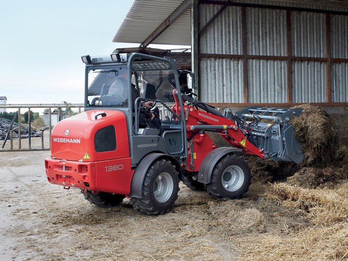 Weidemann 1380 loader moving hay