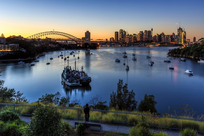 Sydney Harbour at dusk with Harbour Bridge and city skyline
