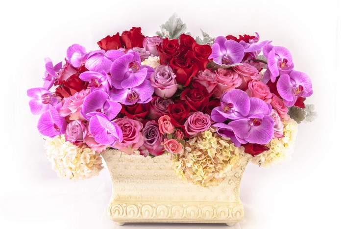 Orchid and Rose Bouquet in Decorative Urn
