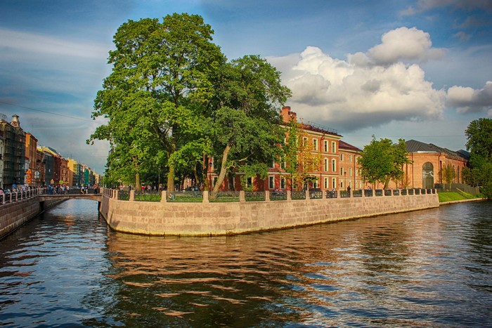 St. Petersburg Canal with Historic Buildings and Trees
