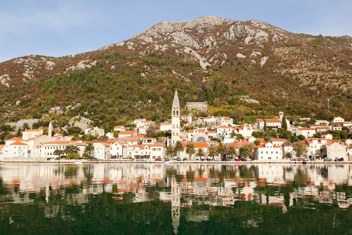 Perast town on Kotor Bay, Montenegro with mountain backdrop