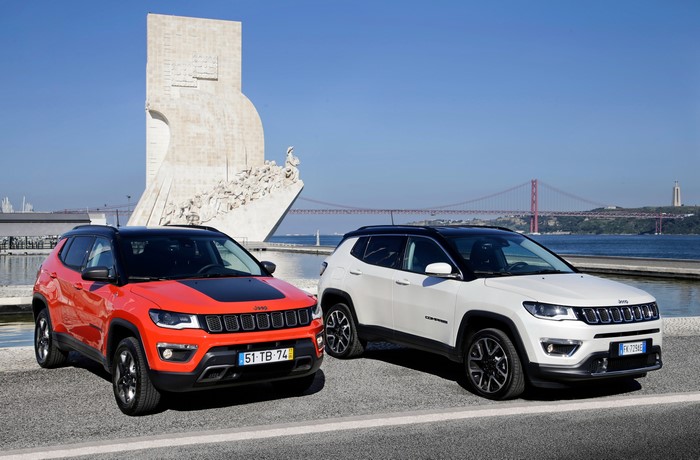 Two Jeep Compass SUVs by Monument and Bridge
