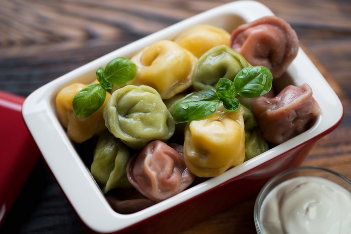 Multicolor Pelmeni in a Red Dish