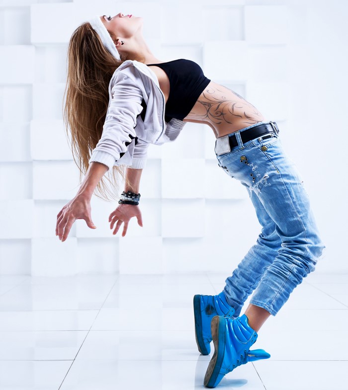 Woman in jeans dancing