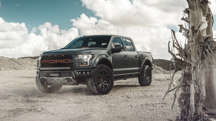 Ford F-150 Raptor pickup truck in a desert landscape