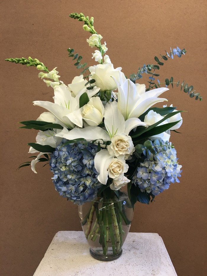White Roses, Lilies, and Blue Hydrangeas in a Vase