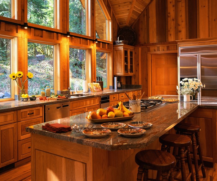Wooden kitchen with large windows and island