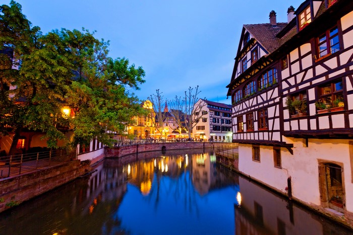 Strasbourg canal with half-timbered houses at dusk