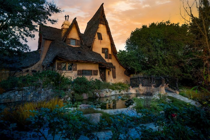 Whimsical cottage with pond and bridge in Los Angeles