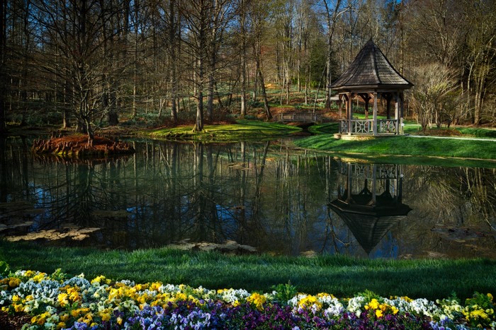 Gazebo reflection in pond at Gibbs Gardens, Georgia, USA