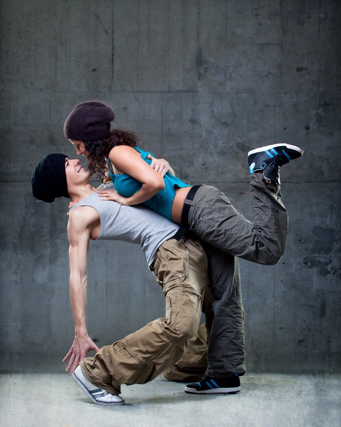 Couple dancing in urban setting